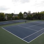two tennis courts by home court